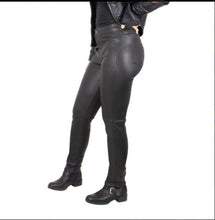 Load image into Gallery viewer, side view of stretch black lambskin leather pant shows detail of back pocket and ankle zipper