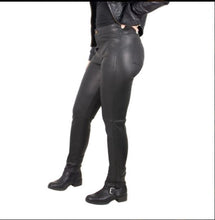 Load image into Gallery viewer, side view of stretch black lambskin leather pant shows detail of back pocket and ankle zipper
